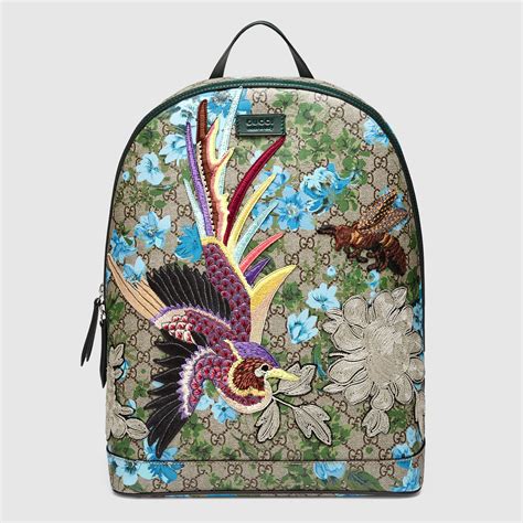 gucci floral print t shirt|Gucci backpack with blue flowers.